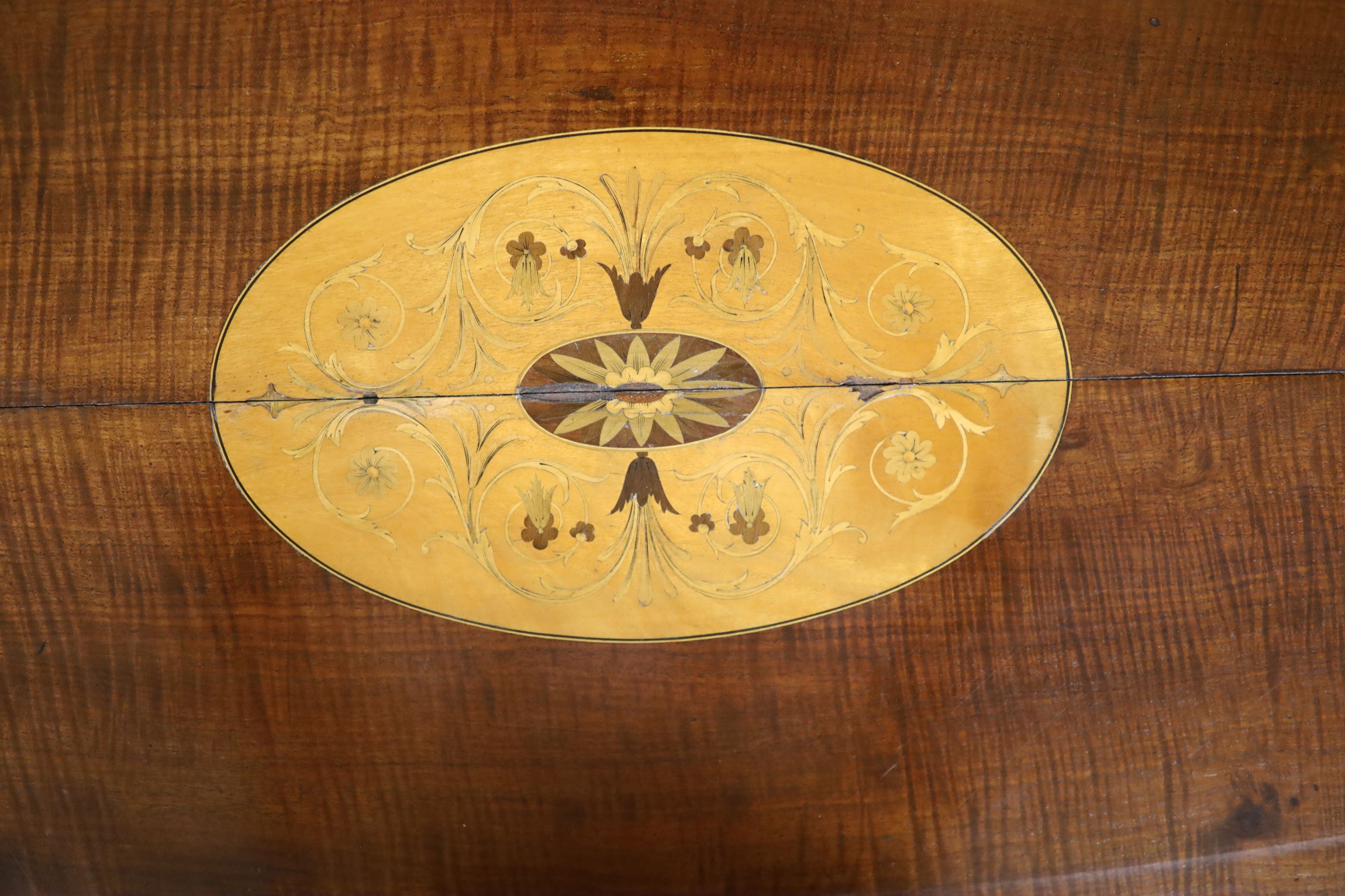 A Regency satin banded inlaid mahogany hinged top writing table, width 93cm depth 61cm height 75cm